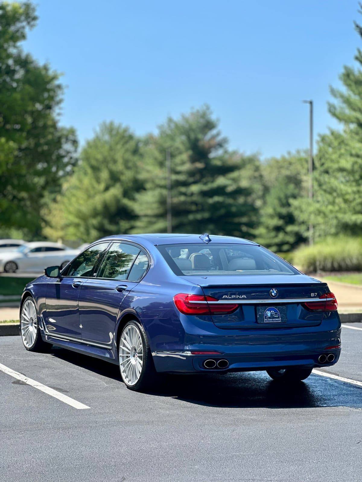 Blue BMW Alpina B7 with mirror finish after detailing in Belleville, IL